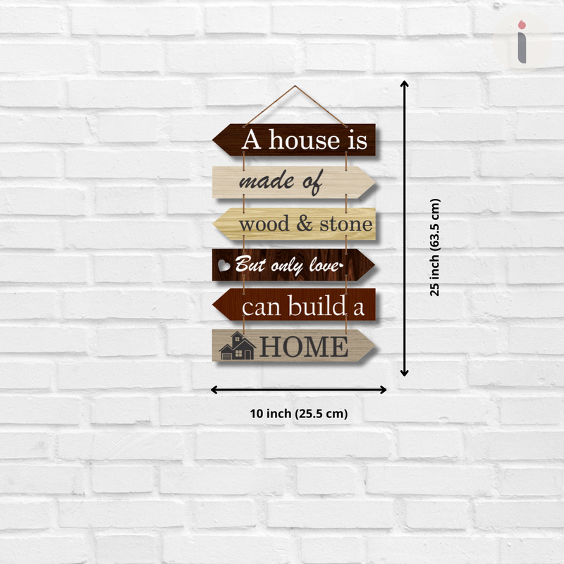 "A house is made of wood and stone, but only love can build a home wall hanging.