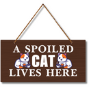 A Spoiled Cat Lives Here Wooden Wall Hanging