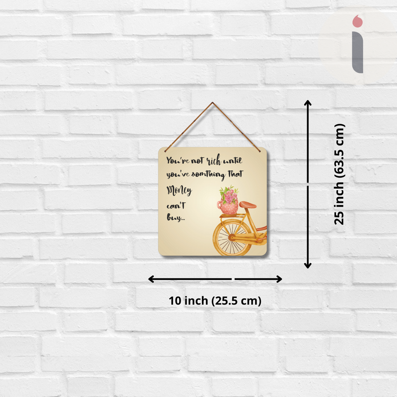 "You're not rich until you've something that money can't but"  Wall Hanging - ICraft asia