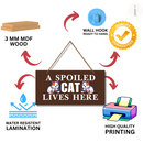 A Spoiled Cat Lives Here Wooden Wall Hanging
