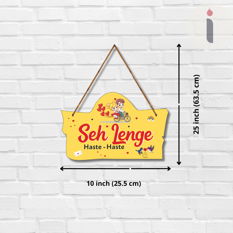 "Sah lenge haste haste" wall hanging