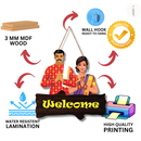 Indian couple wooden welcome hanging