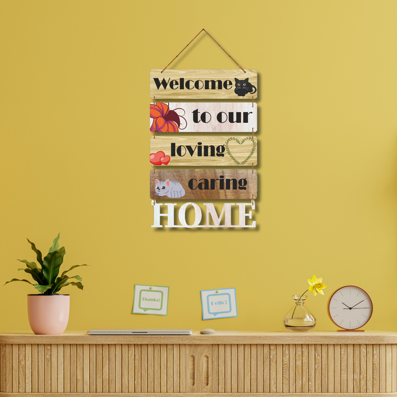 "Welcome to Our Loving Caring Home" wall hanging