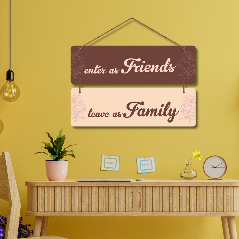 as Friends, Leave as Family" wall hanging