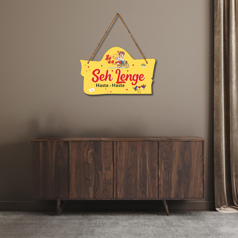 "Sah lenge haste haste" wall hanging